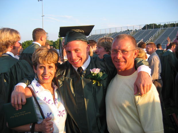 college student with his parents